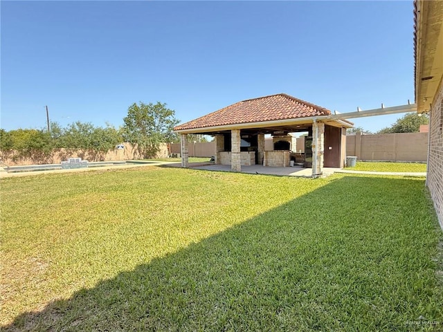 1813 Harvard Ave, Mcallen, TX 78504 - view of yard with a patio area, a gazebo, and an outdoor pool