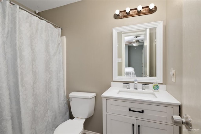 bathroom with toilet, a ceiling fan, and vanity