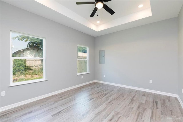 814 N Martinez Ave, Weslaco, TX 78596 - spare room featuring electric panel, a ceiling fan, light wood-style flooring, recessed lighting, and baseboards