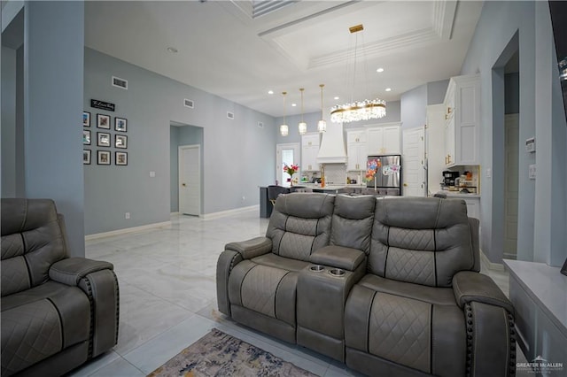 living room featuring a chandelier