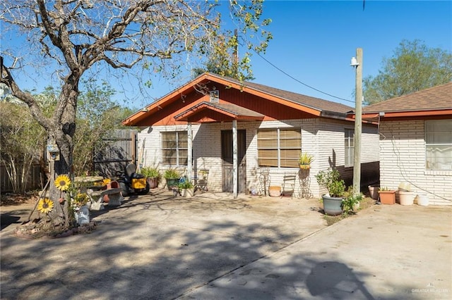 back of house with a patio