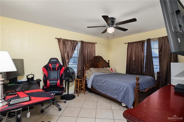 bedroom featuring ceiling fan and light tile patterned floors