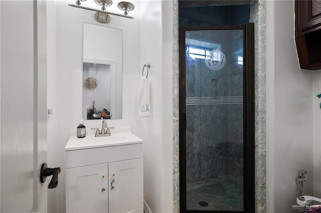 bathroom with vanity and an enclosed shower