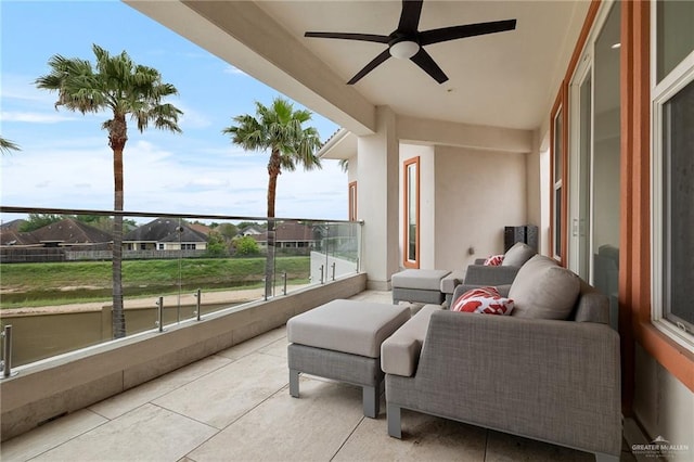 balcony with ceiling fan and an outdoor hangout area