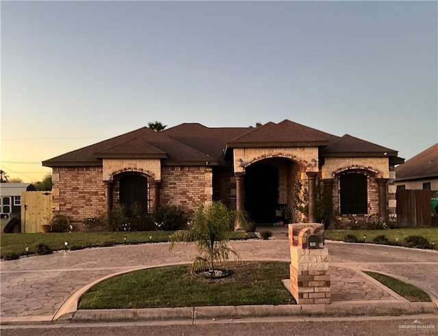 view of front of property with brick siding