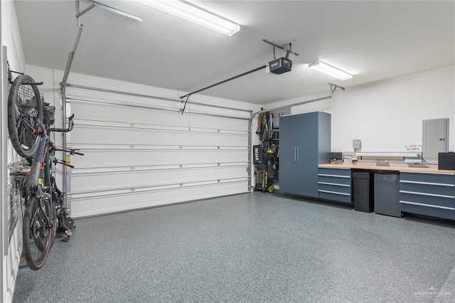 1806 E 28th St, Mission, TX 78574 - garage with electric panel and a garage door opener