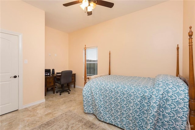 bedroom featuring a ceiling fan and baseboards