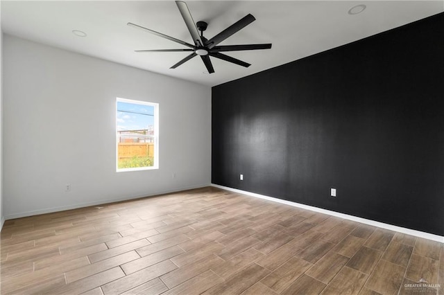 803 Ava Dr, La Feria, TX 78559 - unfurnished room featuring wood finished floors, ceiling fan, and baseboards