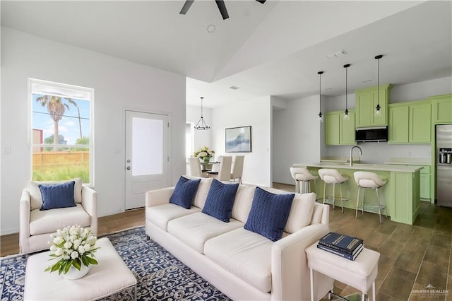 803 Ava Dr, La Feria, TX 78559 - living room featuring dark wood-type flooring, ceiling fan, and lofted ceiling