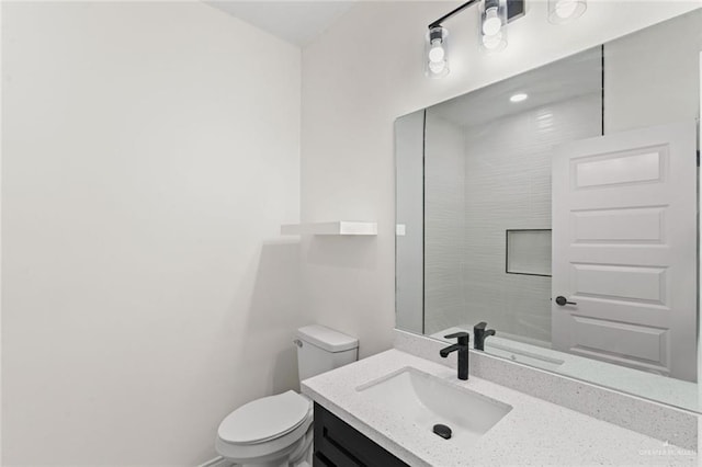 412 Leon Ave, Elsa, TX 78542 - bathroom with vanity and toilet