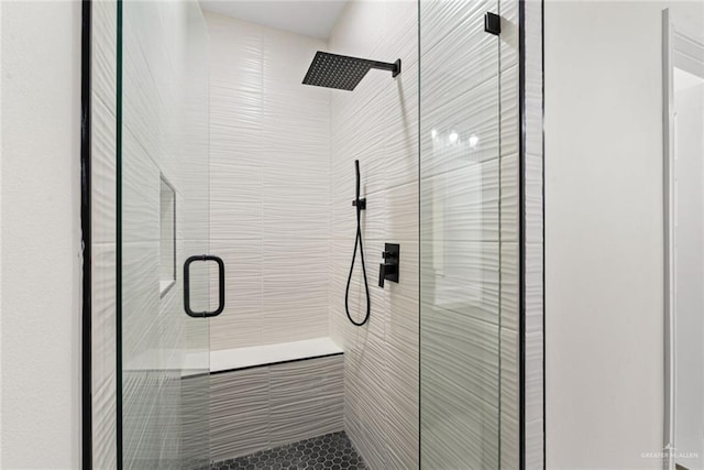 412 Leon Ave, Elsa, TX 78542 - bathroom with a stall shower and tile patterned floors