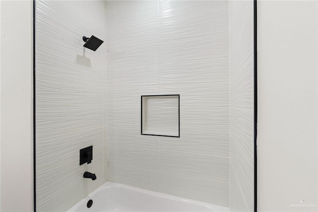 412 Leon Ave, Elsa, TX 78542 - bathroom featuring bathing tub / shower combination