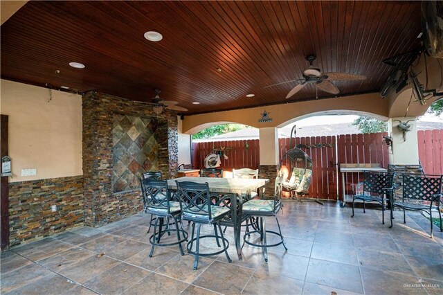 view of patio / terrace featuring ceiling fan