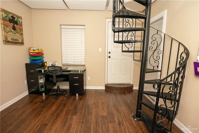 office space with dark hardwood / wood-style flooring