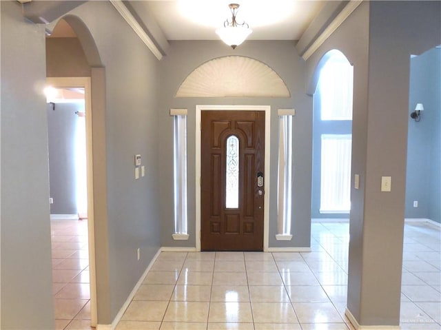 entryway featuring light tile patterned floors