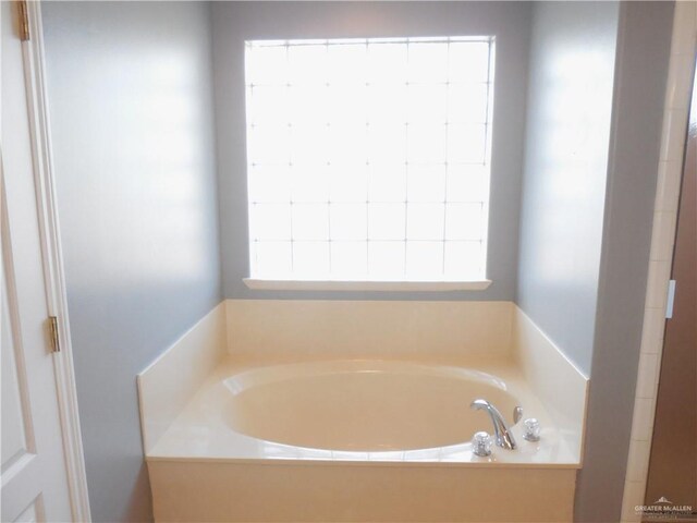 bathroom with a bath