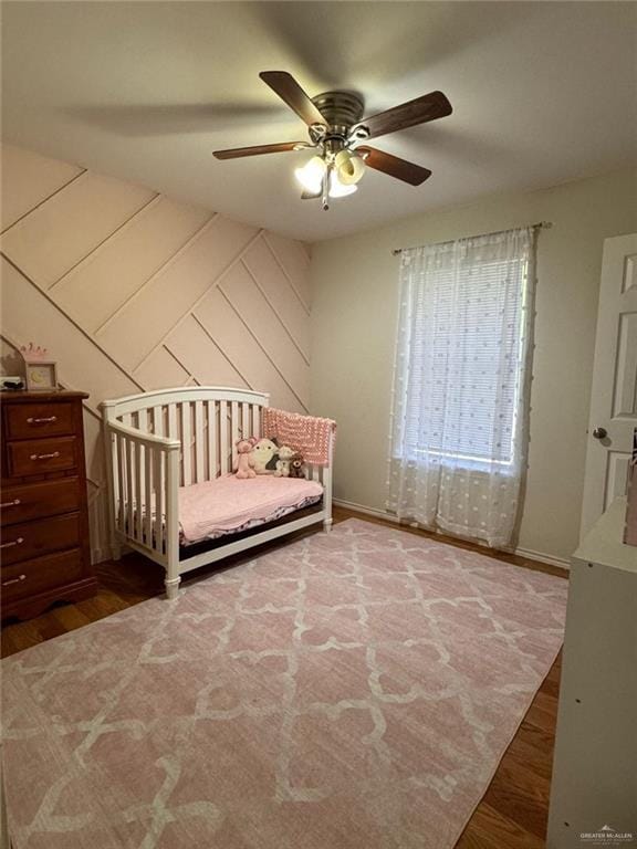9216 N 31st St, Mcallen, TX 78504 - bedroom with wood finished floors and ceiling fan