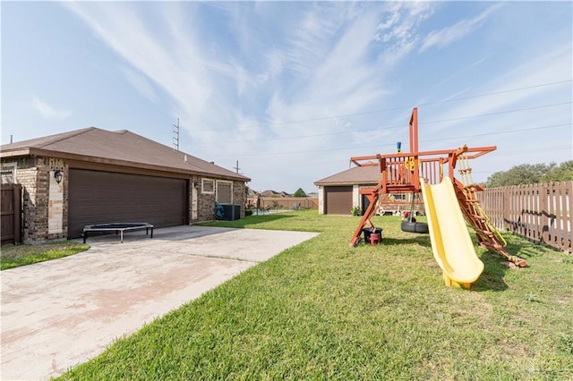 view of playground featuring a yard and cooling unit