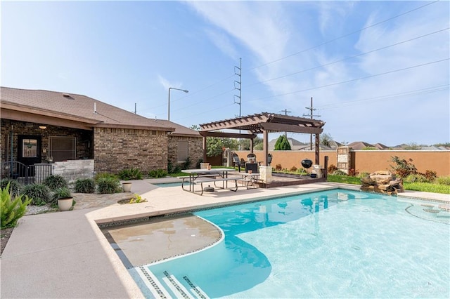 view of pool featuring a pergola and a patio