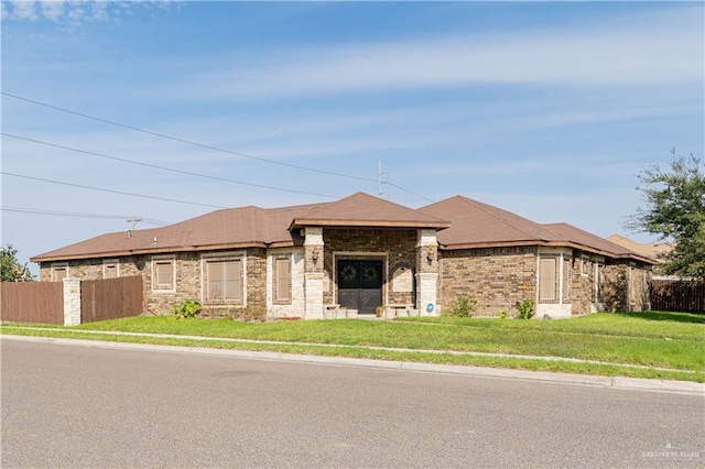 view of front of home with a front yard