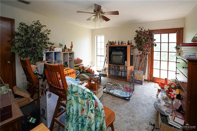 603 S Alamo Rd, Alamo, TX 78516 - carpeted living room with visible vents and a ceiling fan