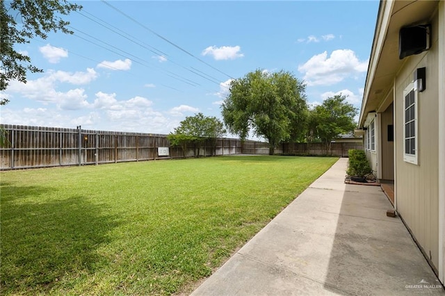 524 Palm Valley Dr E, Harlingen, TX 78552 - view of yard featuring a patio
