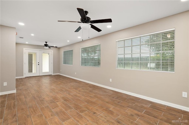 524 Palm Valley Dr E, Harlingen, TX 78552 - empty room featuring a ceiling fan, french doors, baseboards, and recessed lighting