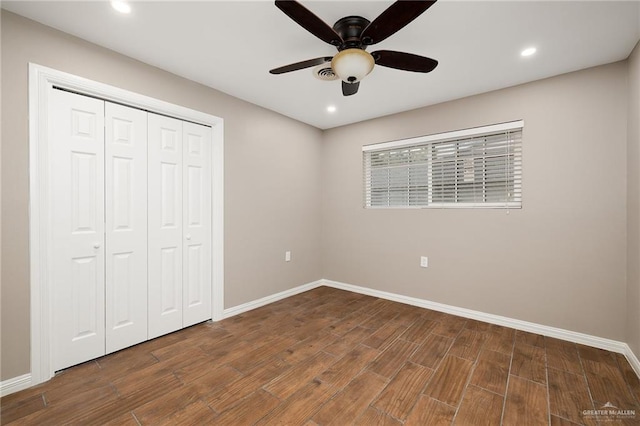 524 Palm Valley Dr E, Harlingen, TX 78552 - unfurnished bedroom with baseboards, wood finished floors, a closet, recessed lighting, and a ceiling fan