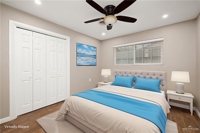 524 Palm Valley Dr E, Harlingen, TX 78552 - bedroom featuring wood finished floors, a closet, recessed lighting, a ceiling fan, and baseboards