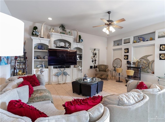 tiled living room featuring ceiling fan