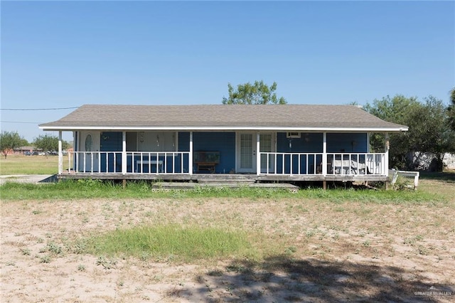 406 S Ave E, Donna, TX 78537 - view of front of property featuring a porch