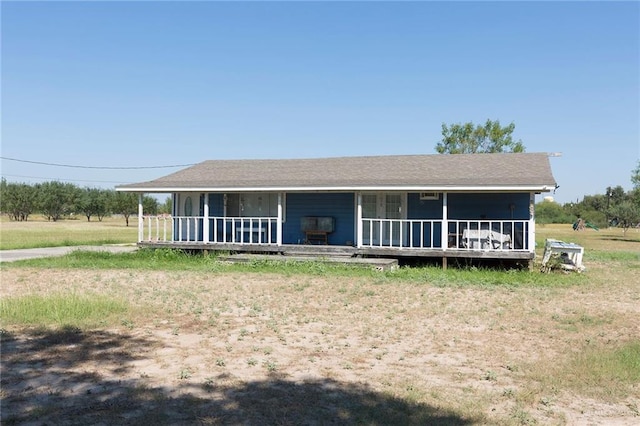 406 S Ave E, Donna, TX 78537 - view of front of home with a porch