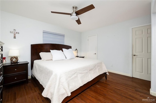 bedroom featuring dark wood-type flooring and ceiling fan