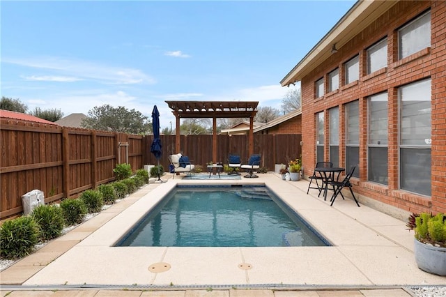 view of swimming pool with a pergola and a patio area