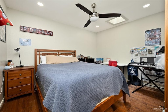 bedroom featuring ceiling fan and dark hardwood / wood-style flooring