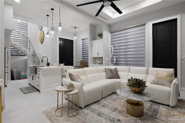 102 E Whiting St Unit A & B, South Padre Island, TX 78597 - living area featuring ceiling fan and stairs