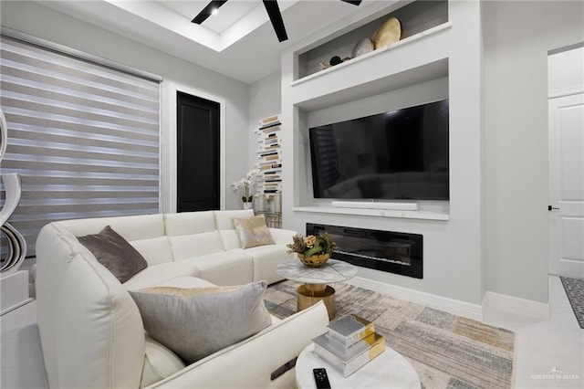 102 E Whiting St Unit A & B, South Padre Island, TX 78597 - living area featuring ceiling fan and baseboards