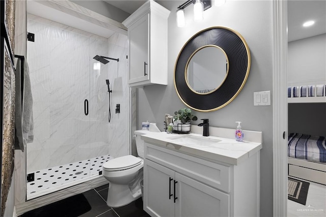 102 E Whiting St Unit A & B, South Padre Island, TX 78597 - bathroom with a marble finish shower, vanity, toilet, tile patterned floors, and recessed lighting