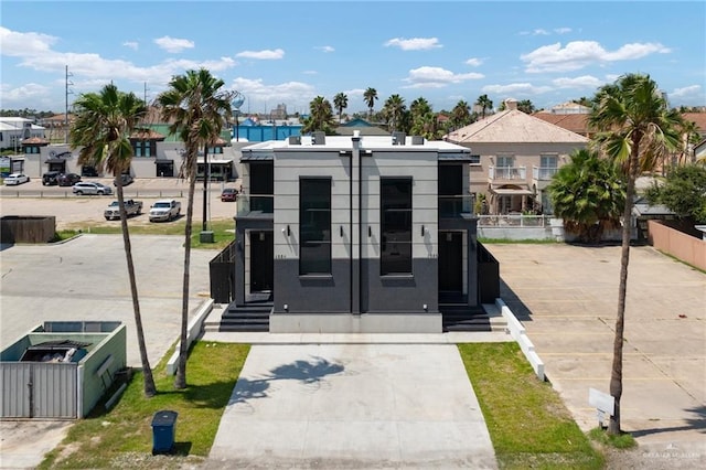 102 E Whiting St Unit A & B, South Padre Island, TX 78597 - view of front of home with entry steps