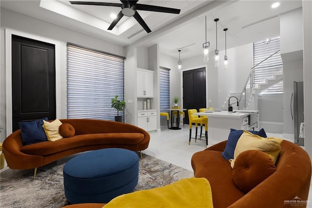 102 E Whiting St Unit A & B, South Padre Island, TX 78597 - living area with a ceiling fan and stairway