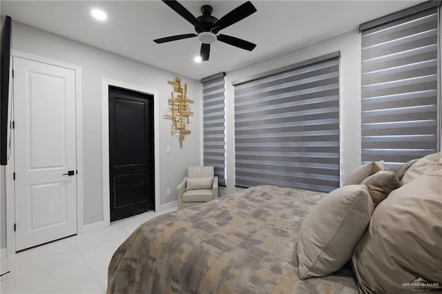 102 E Whiting St Unit A & B, South Padre Island, TX 78597 - bedroom with baseboards, recessed lighting, light tile patterned flooring, and ceiling fan