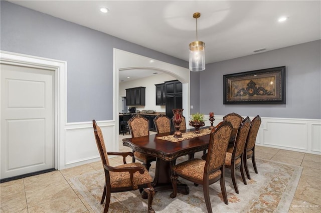 dining area featuring light tile patterned floors