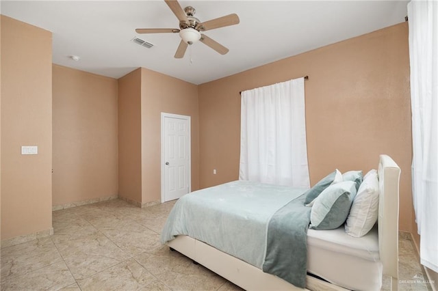 bedroom featuring ceiling fan