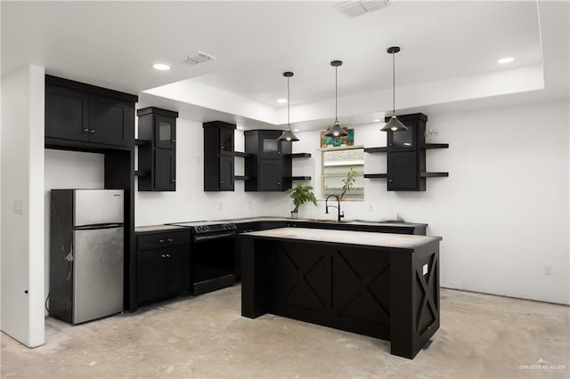 kitchen featuring stainless steel fridge, sink, black electric range, a center island, and hanging light fixtures