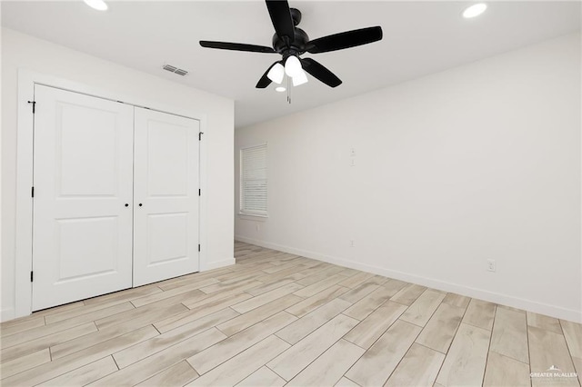 321 E Stubbs St, Edinburg, TX 78539 - unfurnished bedroom featuring light wood-style floors, recessed lighting, a closet, and ceiling fan