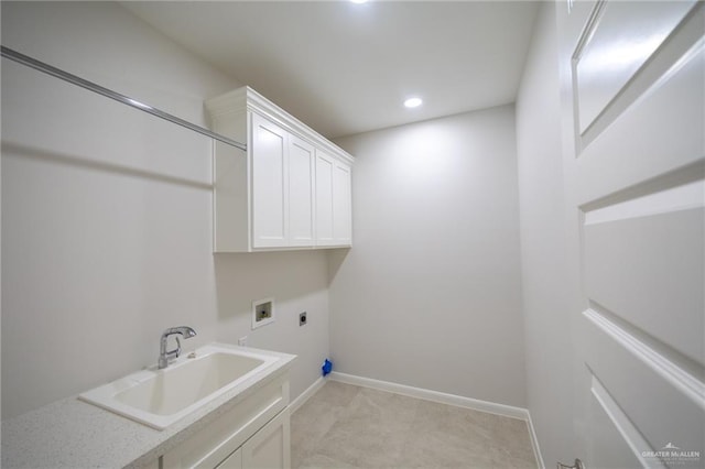 1306 E Danielle Ave, Pharr, TX 78577 - laundry room with electric dryer hookup, cabinet space, washer hookup, recessed lighting, and baseboards