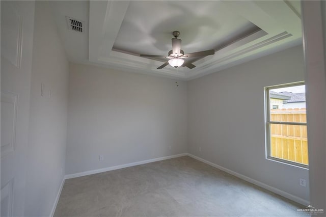 1306 E Danielle Ave, Pharr, TX 78577 - spare room with a tray ceiling, a ceiling fan, and baseboards