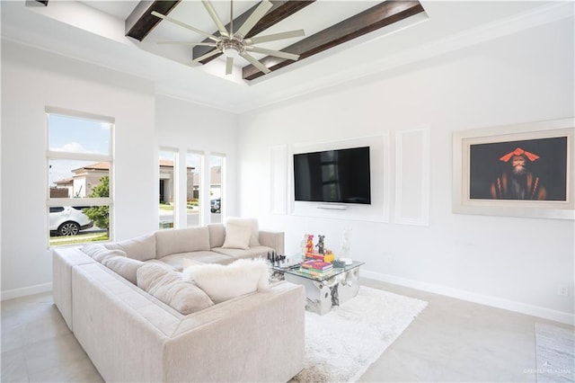 1306 E Danielle Ave, Pharr, TX 78577 - living area with a ceiling fan, beam ceiling, and baseboards