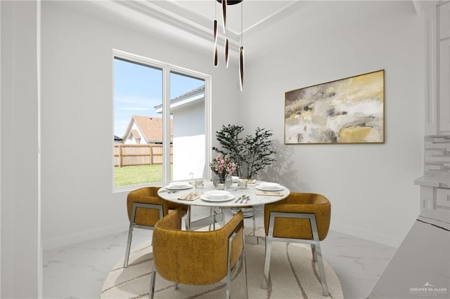 dining area with plenty of natural light