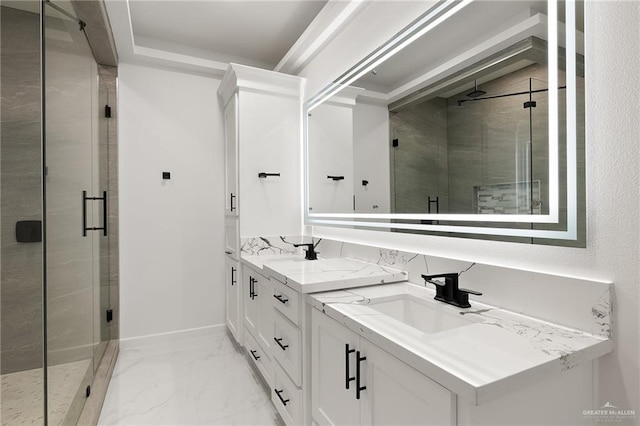 bathroom featuring vanity and a shower with shower door